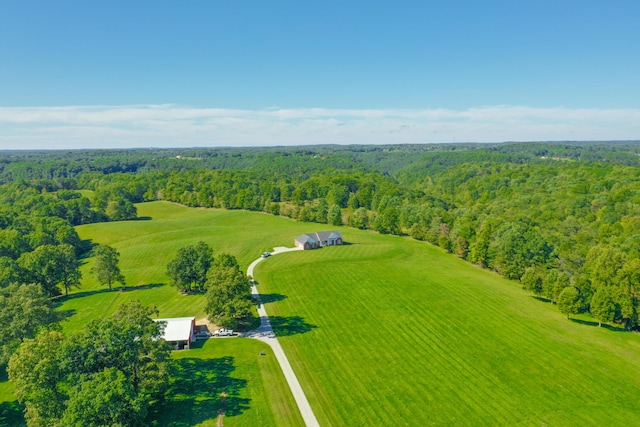 drone / aerial view with a view of trees