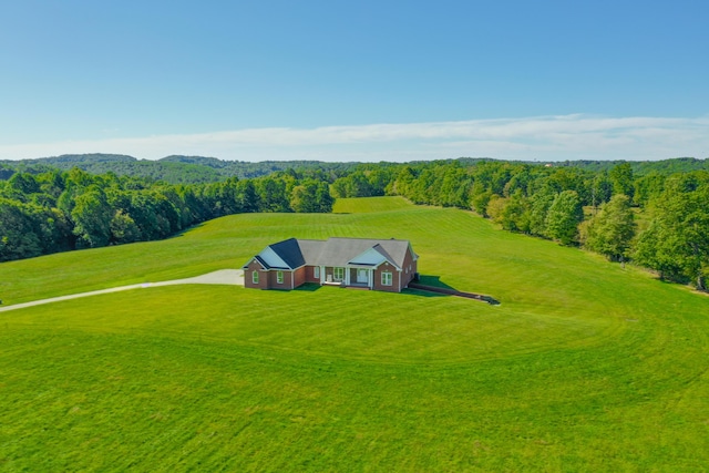 aerial view featuring a view of trees