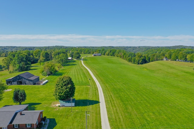 birds eye view of property featuring a rural view