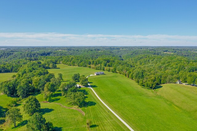 drone / aerial view with a view of trees