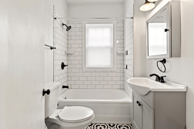 full bath with shower / bathtub combination, vanity, and toilet