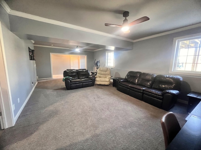 carpeted living area with baseboards, a ceiling fan, and crown molding