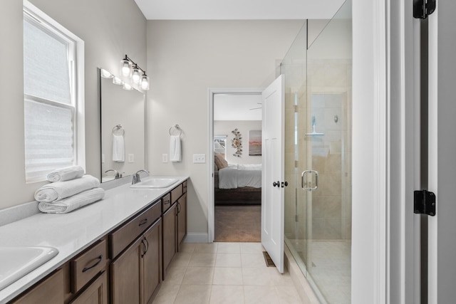 bathroom with double vanity, tile patterned floors, ensuite bath, tiled shower, and a sink