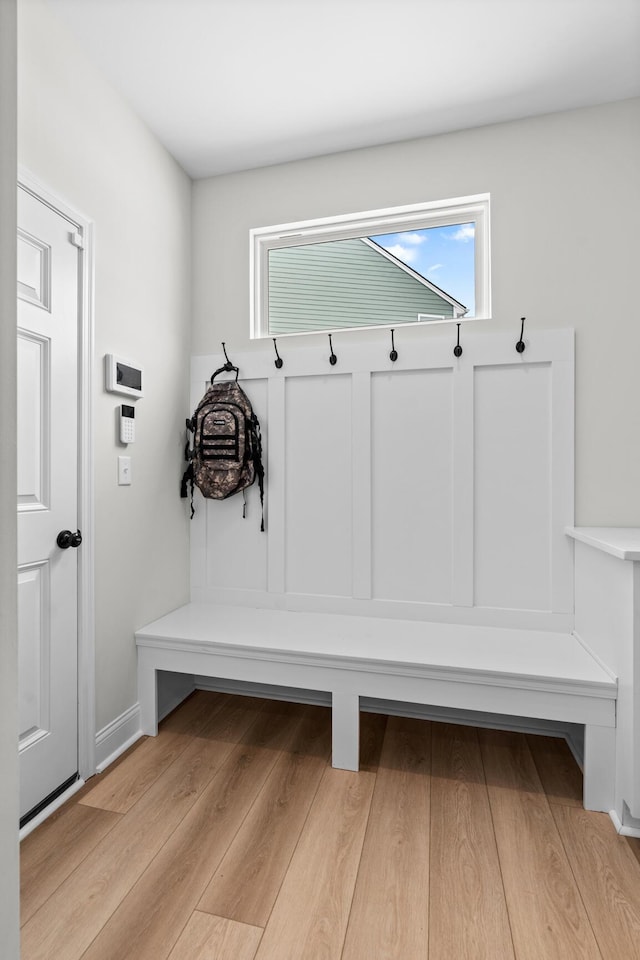 mudroom with wood finished floors