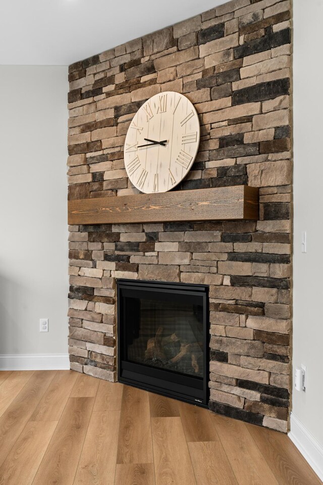 entrance foyer with light wood-style floors, visible vents, and baseboards