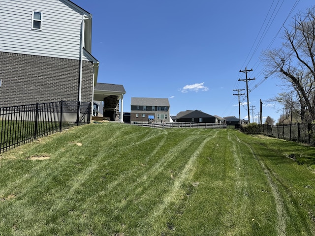 view of yard featuring fence
