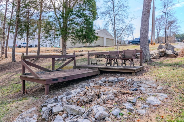 view of yard with a wooden deck