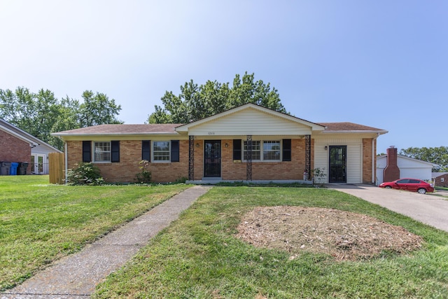 single story home featuring a front lawn and brick siding