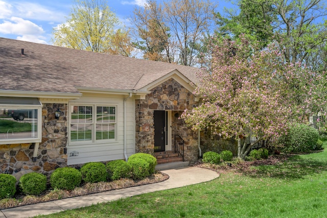 1649 Silver Pheasant Cir, Lexington, KY 40511 - view of front of property with a shingled roof, stone siding, and a front lawn