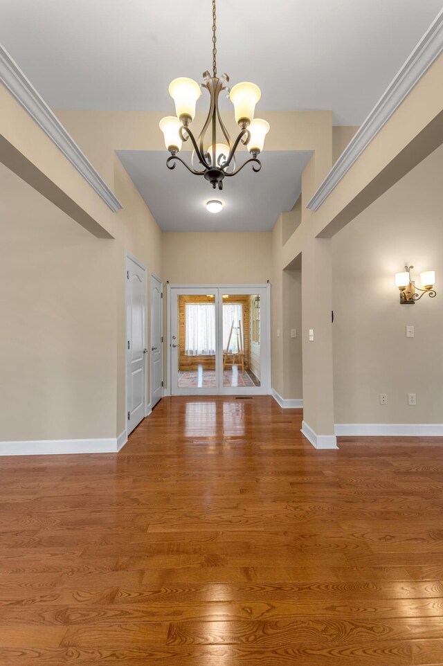 1649 Silver Pheasant Cir, Lexington, KY 40511 - interior space with wood finished floors, a notable chandelier, and baseboards