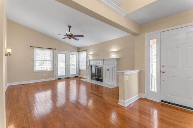 1649 Silver Pheasant Cir, Lexington, KY 40511 - entryway featuring baseboards, vaulted ceiling, light wood-type flooring, a ceiling fan, and a premium fireplace