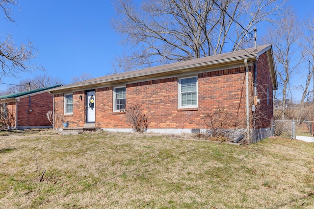 ranch-style house with a front yard, a gate, brick siding, and fence