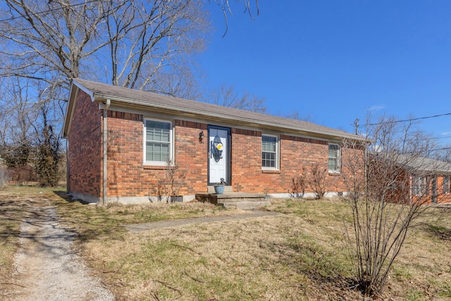 view of front of home featuring brick siding