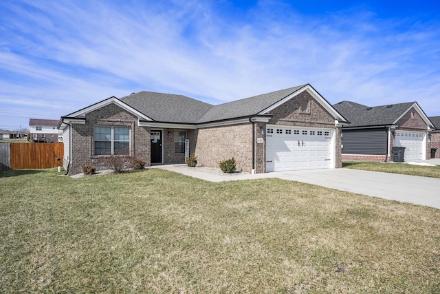 view of front facade with driveway, a front lawn, an attached garage, and fence