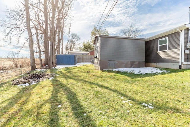 view of yard featuring fence