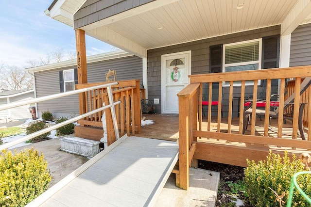 entrance to property with a porch