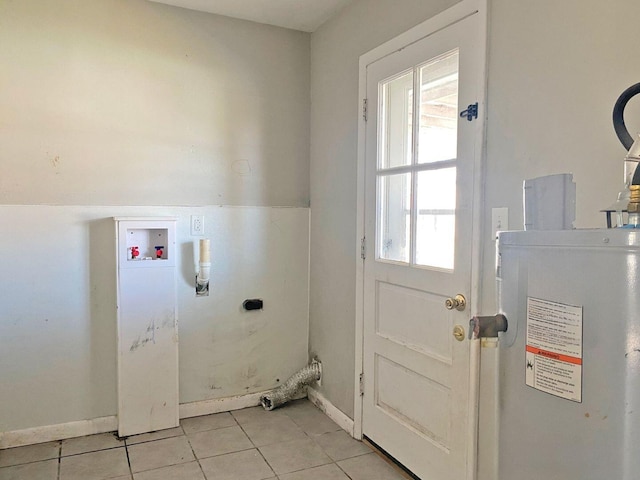 laundry area featuring washer hookup, laundry area, electric dryer hookup, and light tile patterned floors