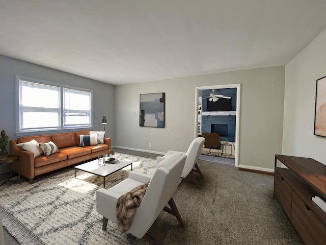 living room with carpet floors, a brick fireplace, and baseboards