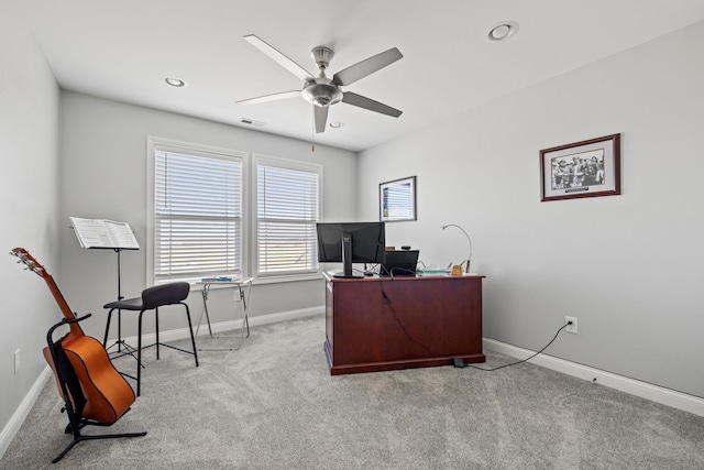 carpeted office with visible vents, baseboards, a ceiling fan, and recessed lighting