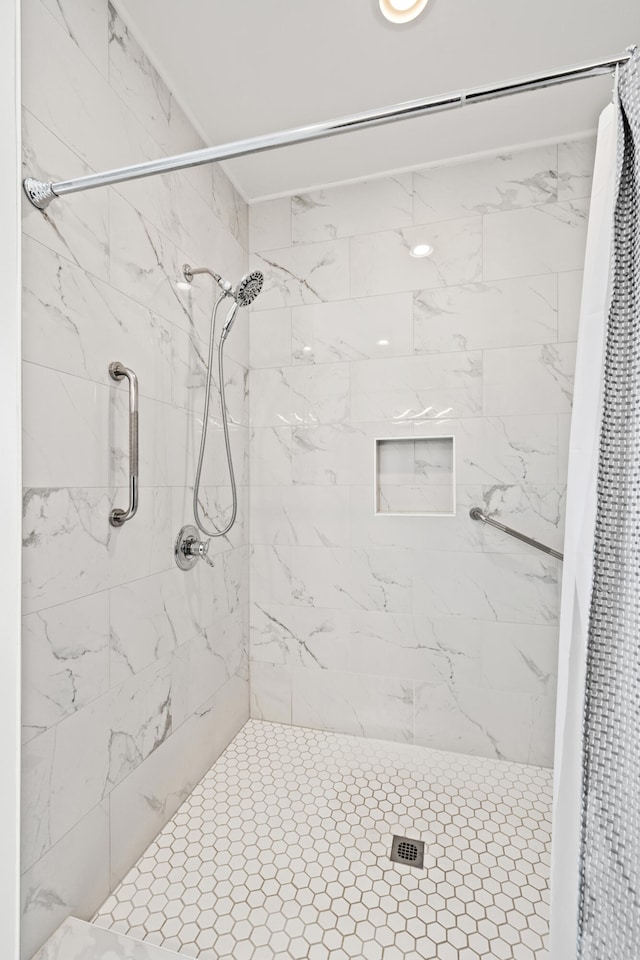 bathroom with a stall shower