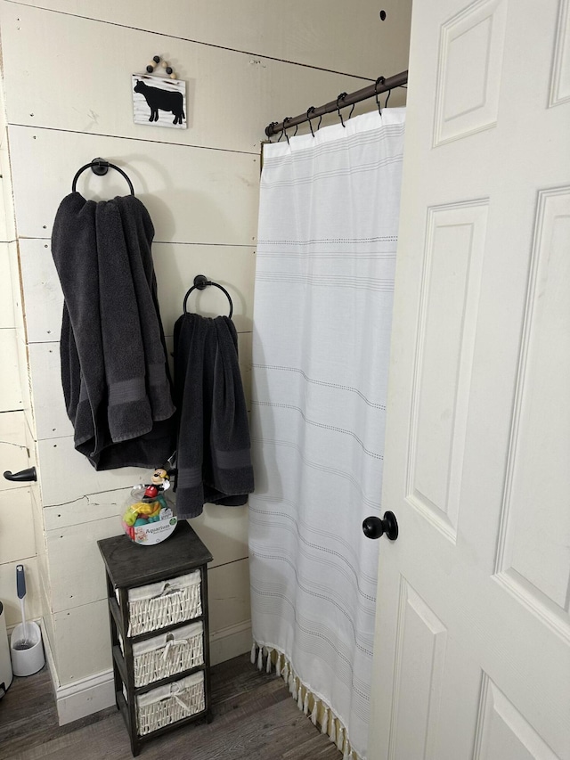 bathroom featuring wood finished floors