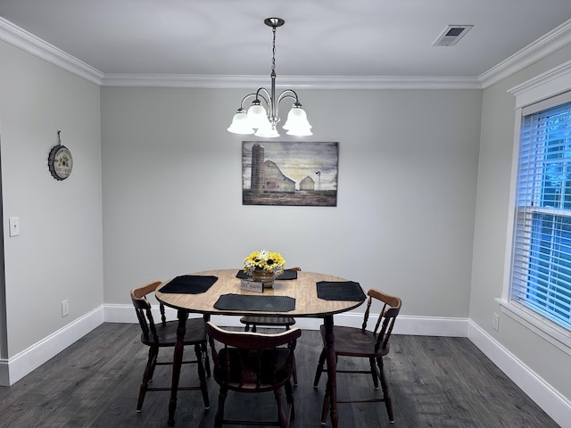1232 Hurt Ln, Lancaster, KY 40444 - dining space with visible vents, ornamental molding, baseboards, a chandelier, and dark wood finished floors