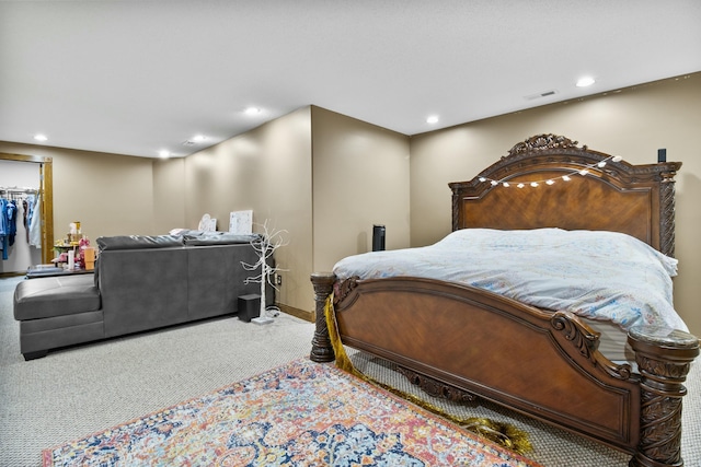 bedroom with recessed lighting, visible vents, and carpet flooring