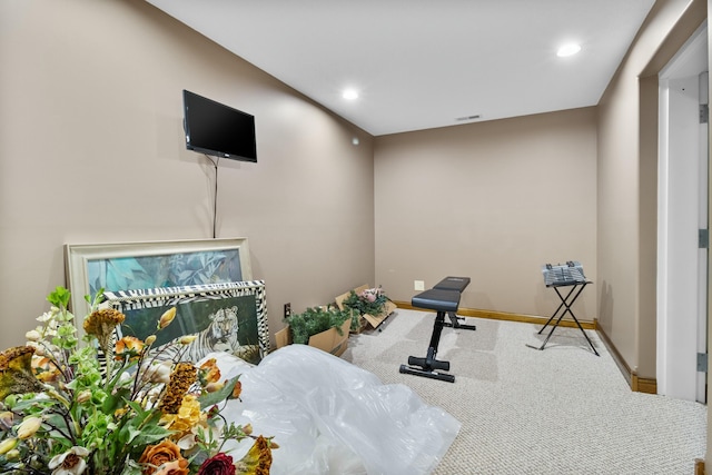 exercise room with carpet floors, baseboards, and recessed lighting