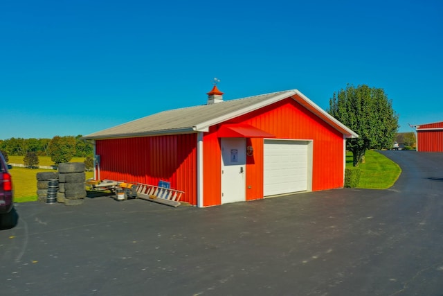 exterior space with an outbuilding