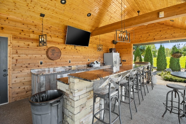 exterior space with outdoor wet bar