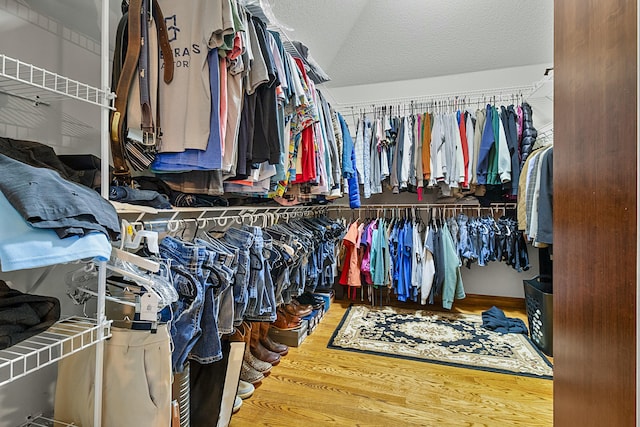 spacious closet with wood finished floors