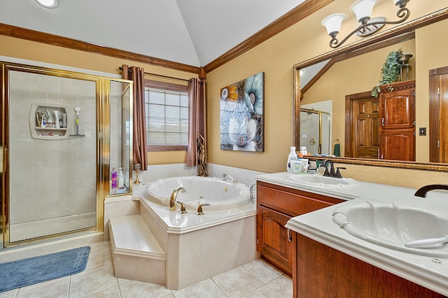 bathroom with a sink, vaulted ceiling, a shower stall, a bath, and tile patterned floors