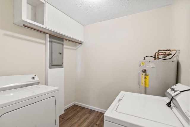 laundry area featuring laundry area, electric panel, washing machine and clothes dryer, and electric water heater