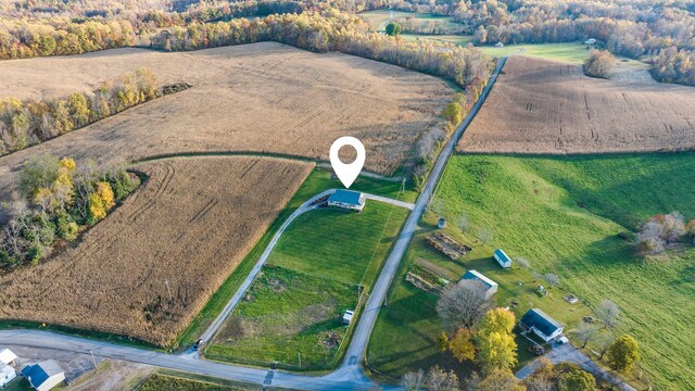 birds eye view of property featuring a rural view