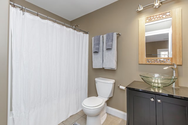 full bathroom with baseboards, toilet, curtained shower, tile patterned flooring, and vanity