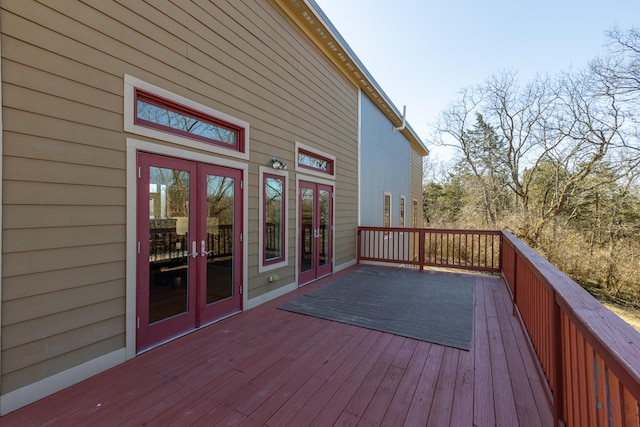 wooden deck featuring french doors