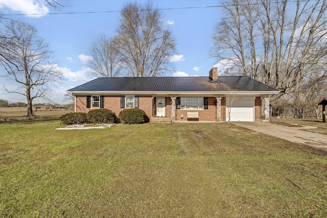 ranch-style house featuring brick siding, a chimney, concrete driveway, a garage, and a front lawn