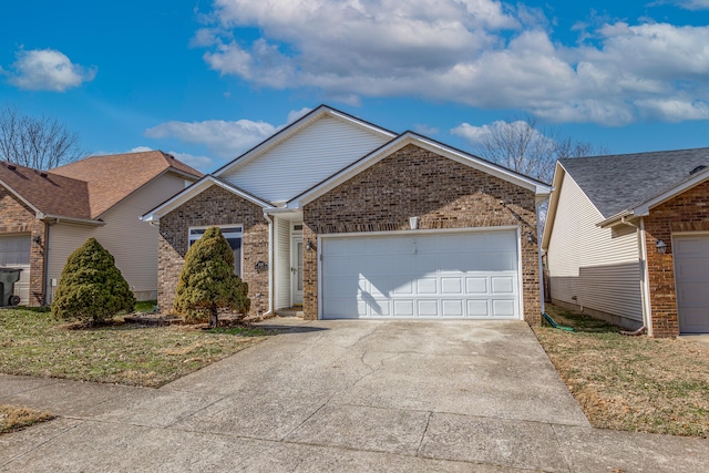 ranch-style house featuring driveway, brick siding, and an attached garage