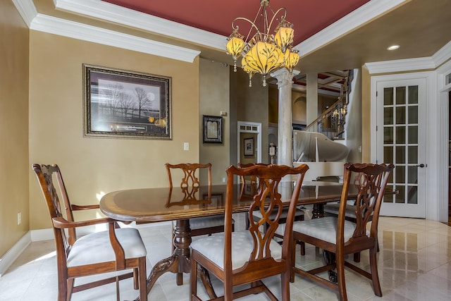 dining space with crown molding, light tile patterned floors, a raised ceiling, an inviting chandelier, and baseboards