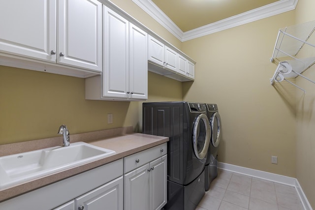 clothes washing area with washer and clothes dryer, light tile patterned floors, cabinet space, ornamental molding, and a sink