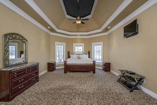 carpeted bedroom featuring ornamental molding, multiple windows, and baseboards