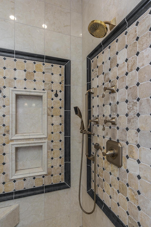 details with a tile shower