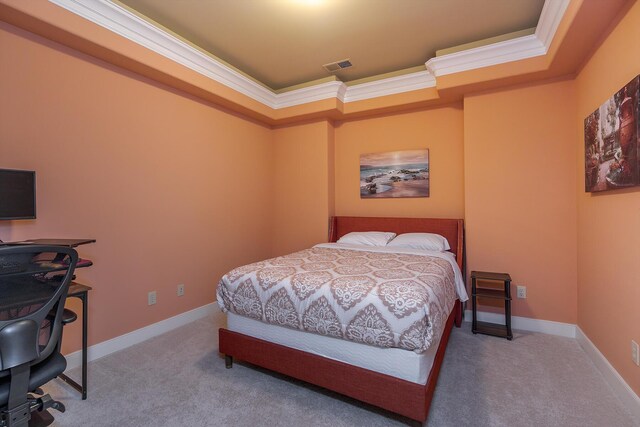 bedroom with carpet flooring, visible vents, and crown molding