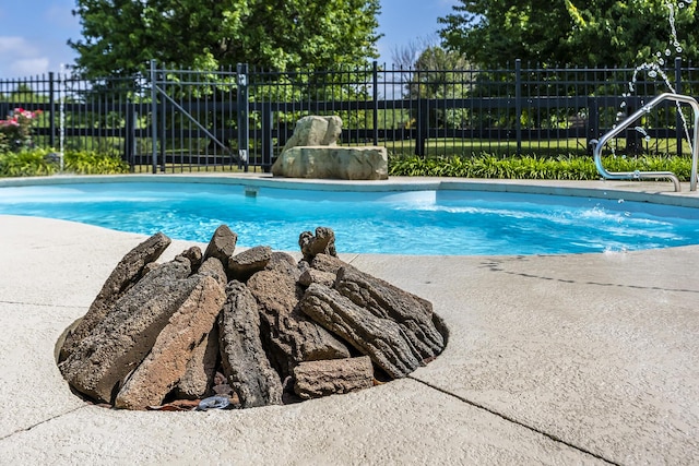 view of pool with fence and a fenced in pool