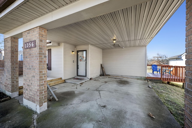 view of patio / terrace featuring an attached carport