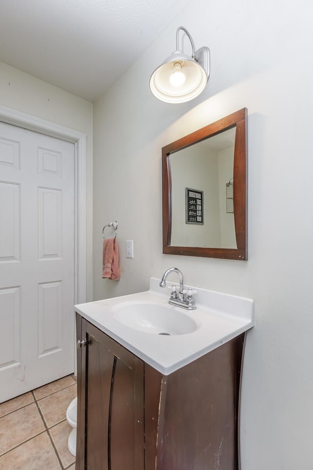 bathroom with vanity and tile patterned floors