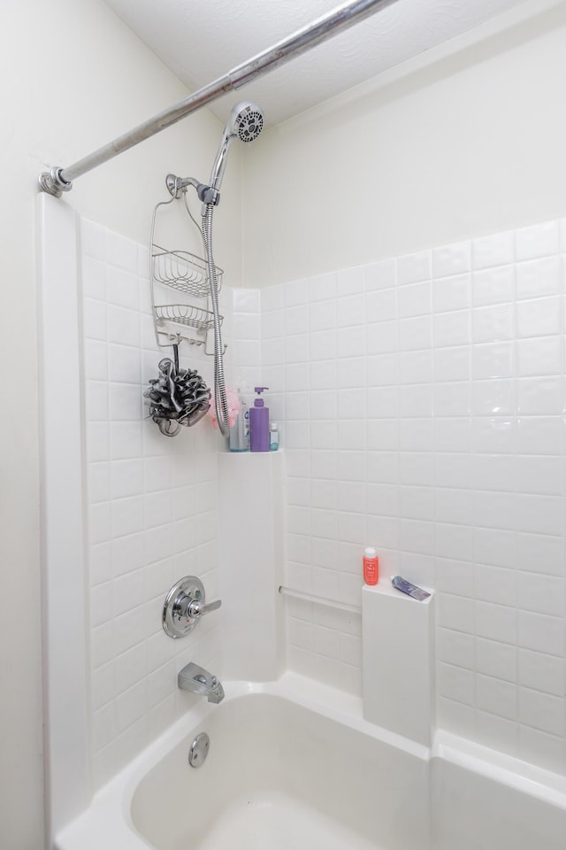 bathroom with shower / bath combination