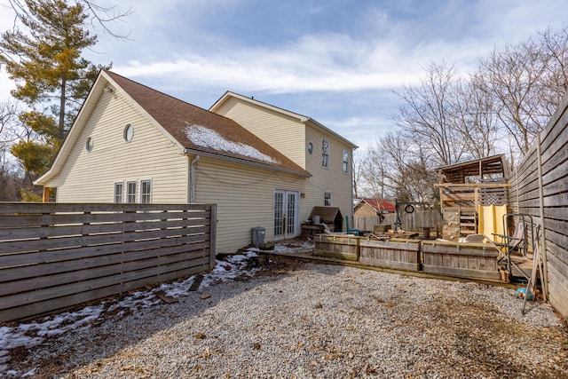 view of property exterior featuring roof with shingles