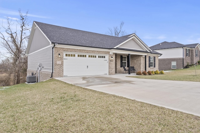 ranch-style home featuring concrete driveway, brick siding, a front lawn, and an attached garage