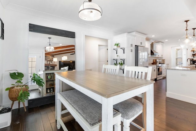 dining space featuring dark wood-style floors and recessed lighting